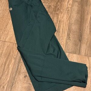 lululemon athletica woman’s dark green long sleeved compression shirt